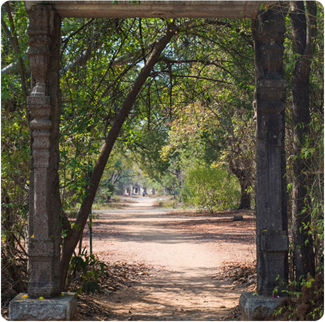 carved stone pillar on the entrance of beauty path